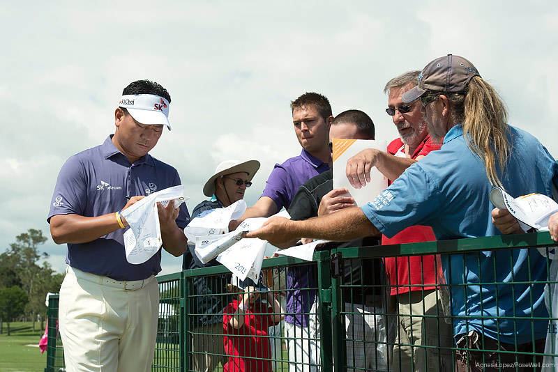 PLAYERS Champion KJ Choi signing autographs at TPC Sawgrass from THE PLAYERS 2013 by Agnes Lopez