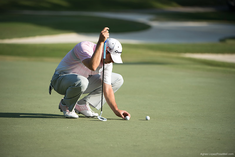 Sergio Garcia placing his ball to putt at TPC Sawgrass from THE PLAYERS 2013 by Agnes Lopez