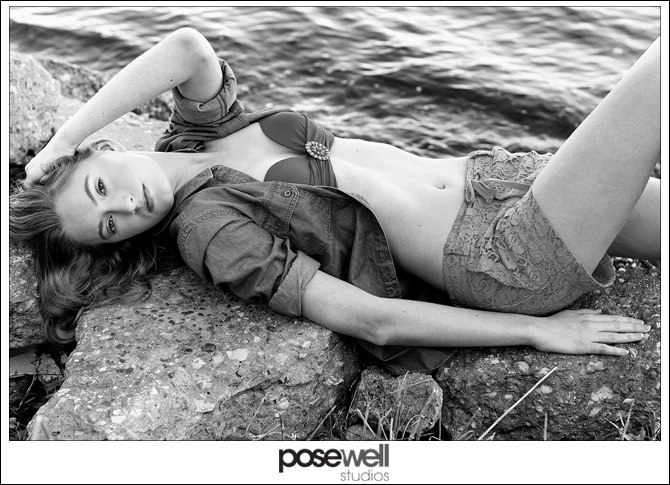 Model in swimsuit on the rocks