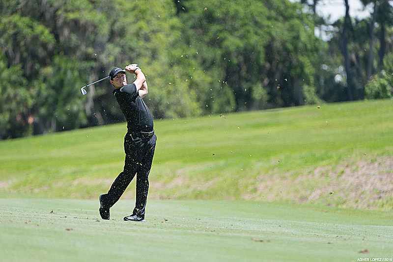 Rory McIlroy hitting an iron shot at The PLAYERS 2015 - photo by Agnes Lopez